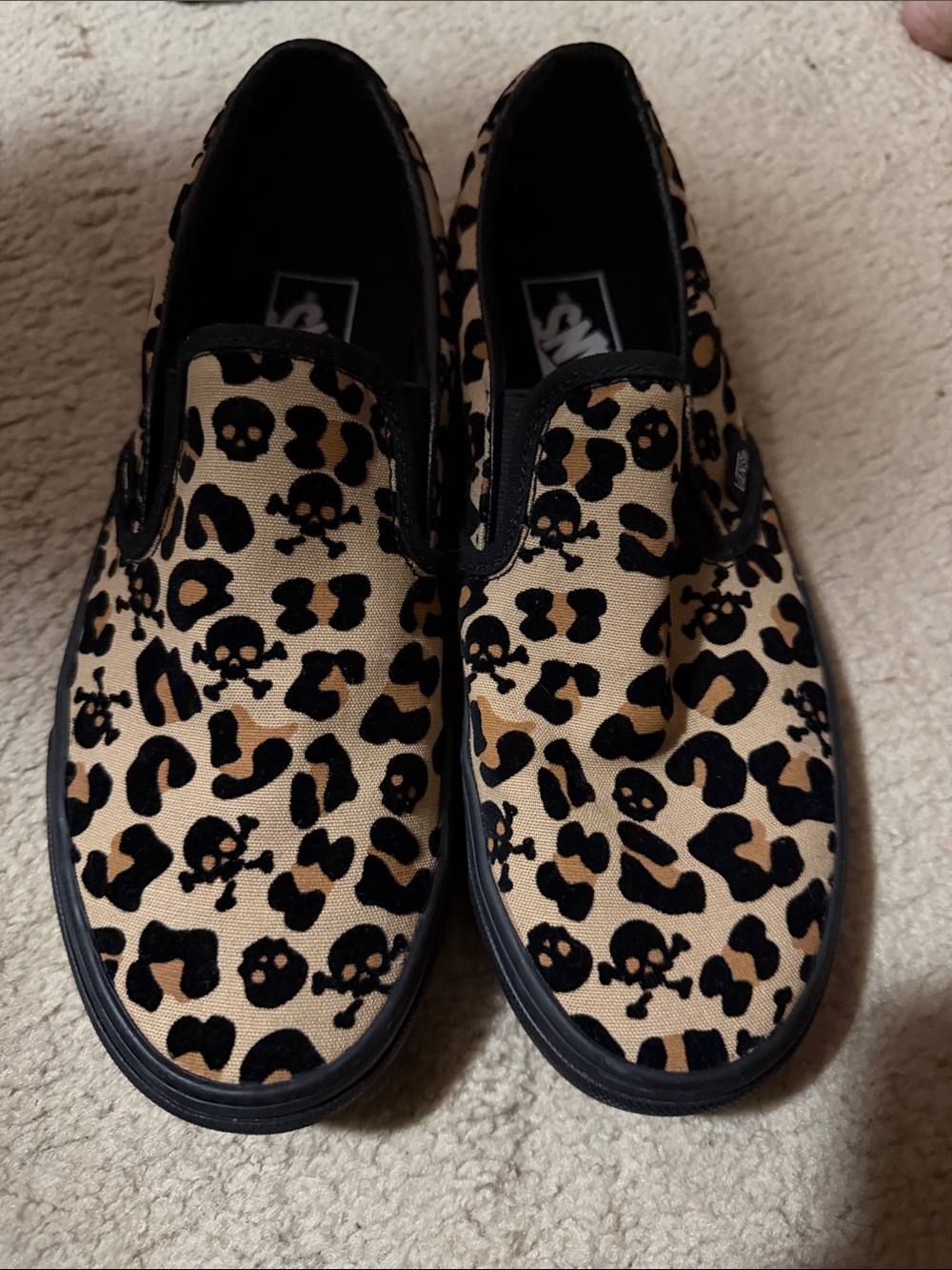 Vans woman’s Slip-On Sneakers in Tan and Black Leopard & Skull Print